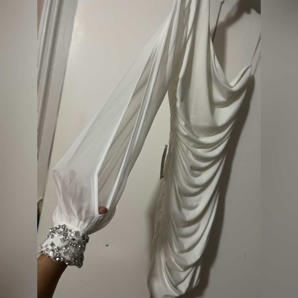 New with tag, white jeweled one shoulder long sleeve